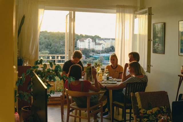 Guests enjoying an Airbnb stay that generates passive income for the host.